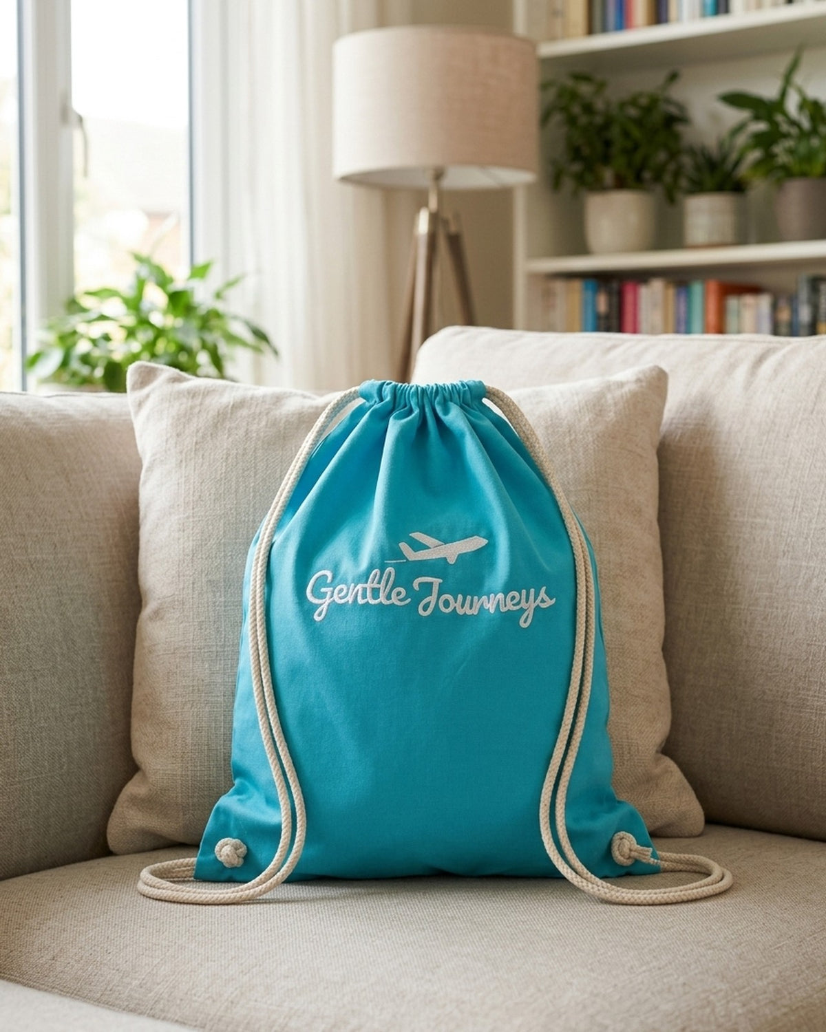 Blue Soft Cotton sensory travel bag on a sofa at home