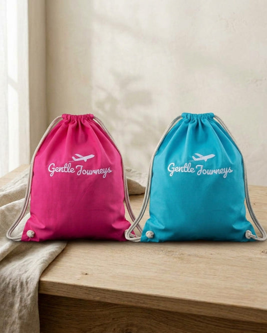 The pink and blue Soft Cotton sensory travel bags side by side