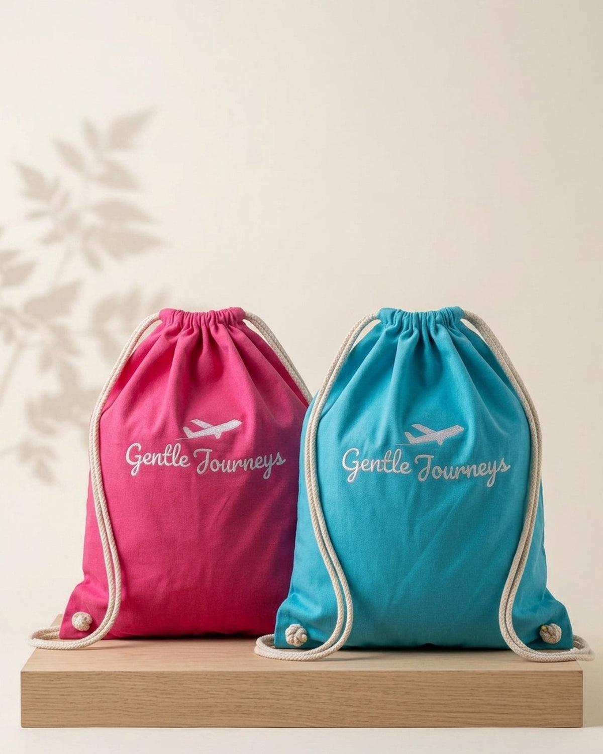 The pink and blue Soft Cotton sensory travel bags side by side