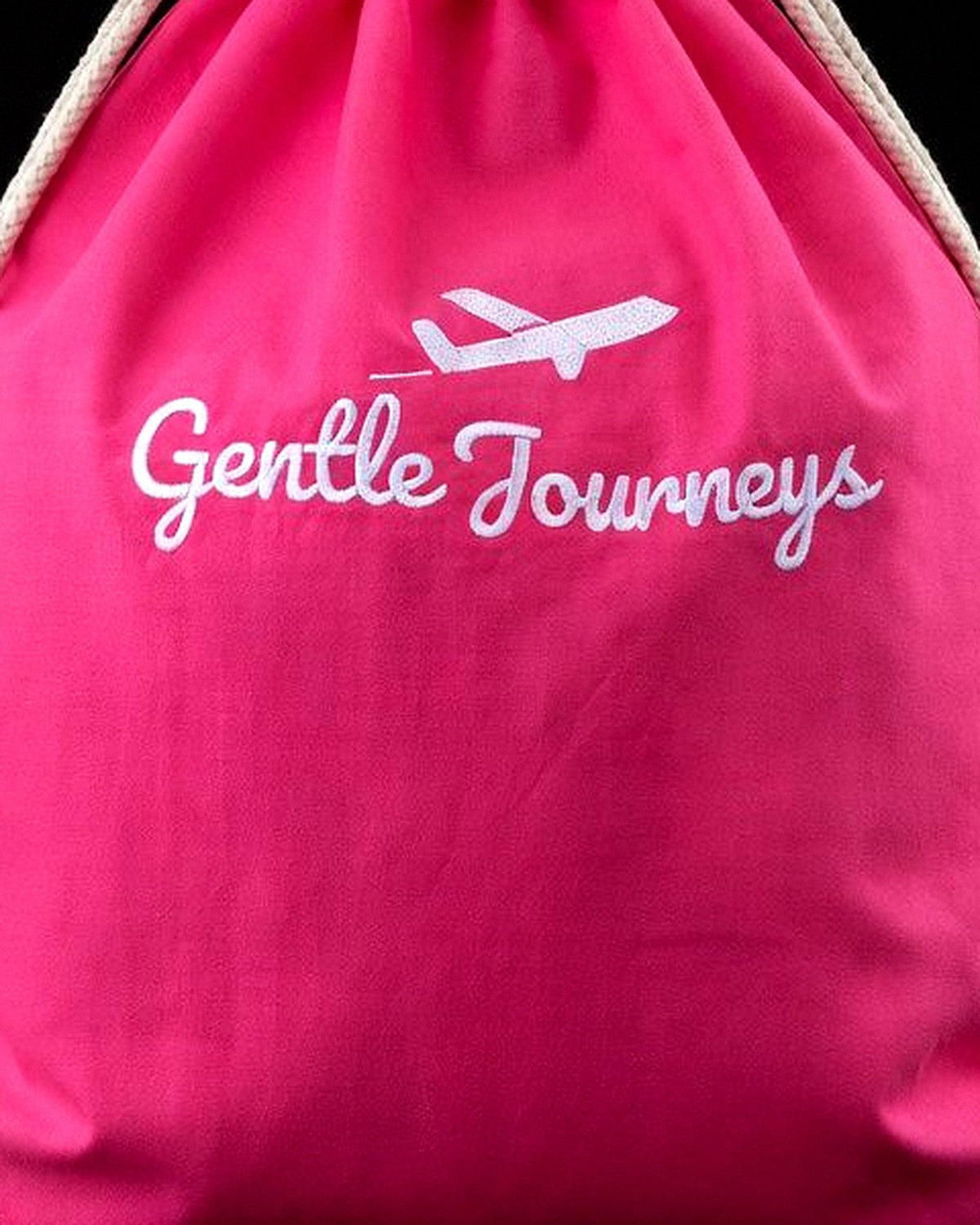 Close-up of the soft cotton fabric of the pink Soft Cotton sensory travel bag