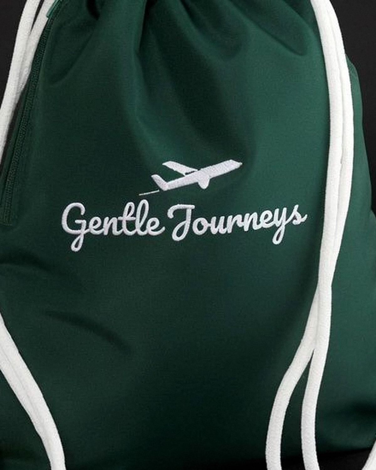 Close-up of the water-resistant fabric of the green Water-Resistant sensory travel bag