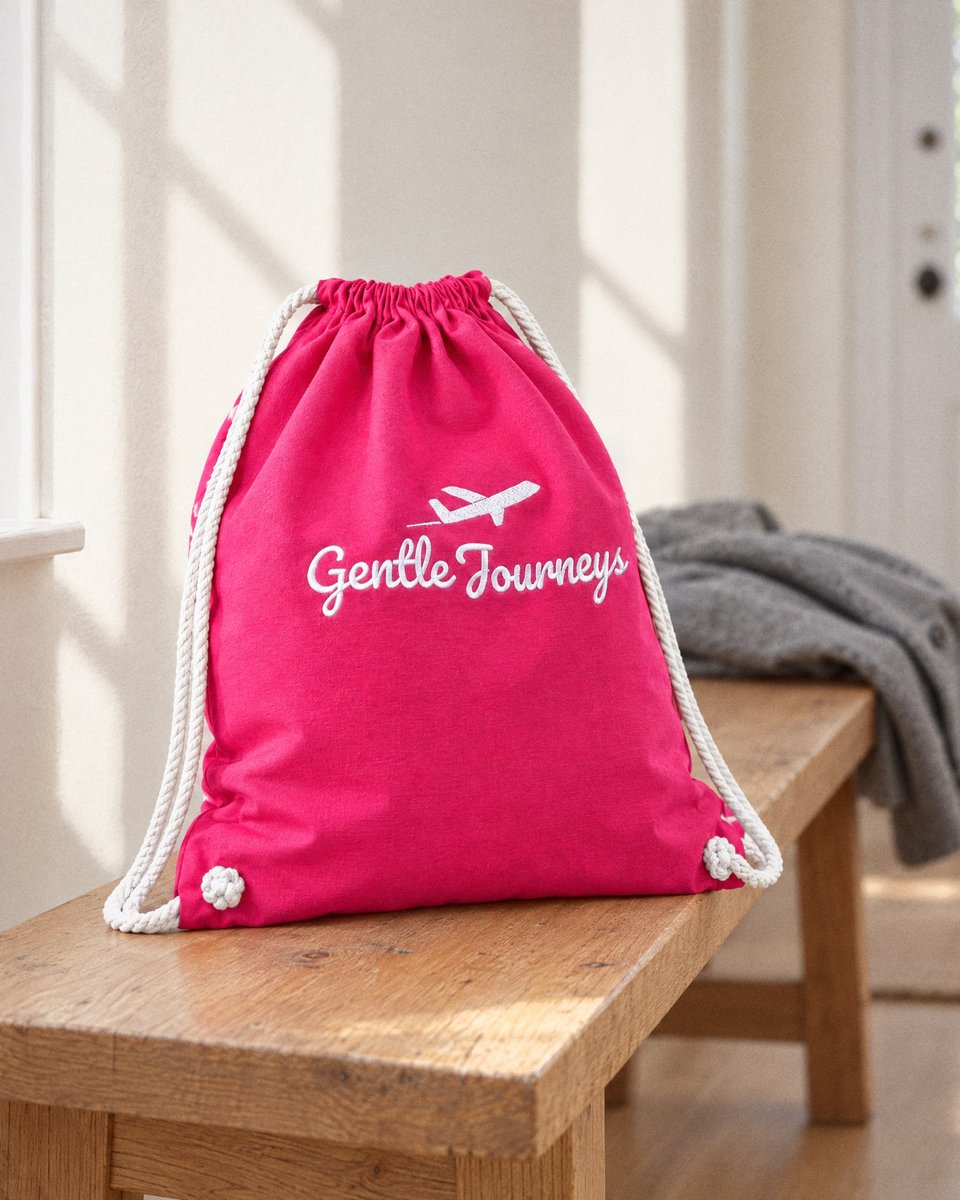 Pink Soft Cotton Gentle Journeys drawstring bag with white cotton cords, front view on white